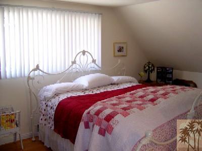 53835 Tollgate Road Idyllwild, CA 92549 - Photo 7 of 11 a bedroom with a bed and a window