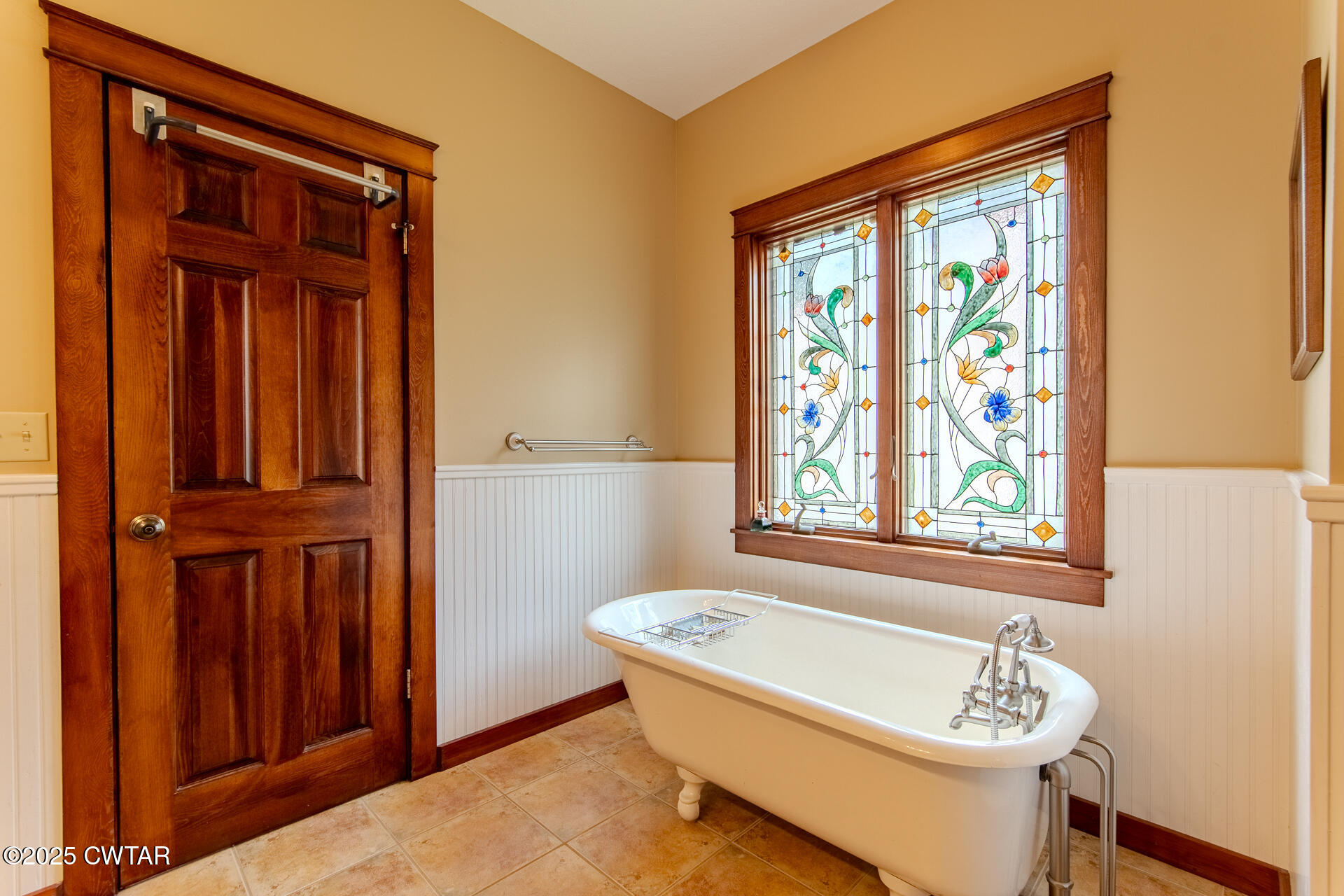3554 Shades Bridge Road Greenfield, TN 38230 - Photo 25 of 49 a bathroom with a bathtub and next to a window