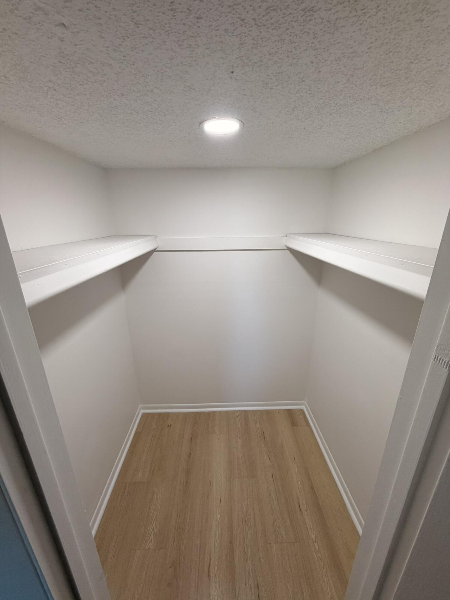 9374 Southwest 3rd Street, Unit 714 Boca Raton, FL 33428 - Photo 15 of 21 a view of small space with racks on the wall