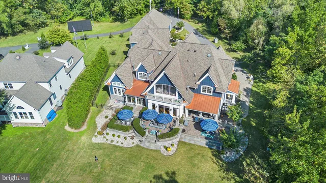 a view of swimming pool with outdoor seating and city view