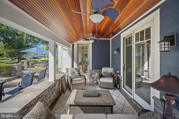 a very nice looking living room with a large window