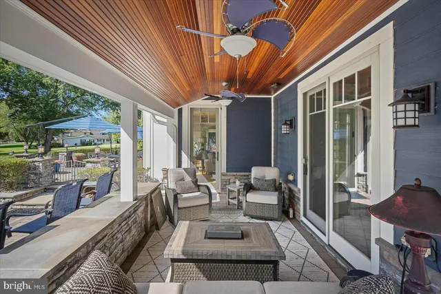 a very nice looking living room with a large window
