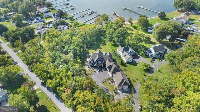a living room with furniture a rug and a large window