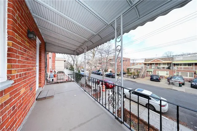 a view of a street from a balcony