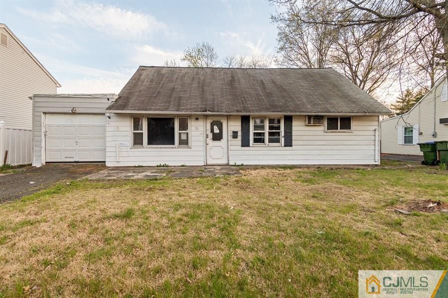 25 Brookville Road Edison, NJ 08817 - Photo 2 of 11 a front view of a house with yard