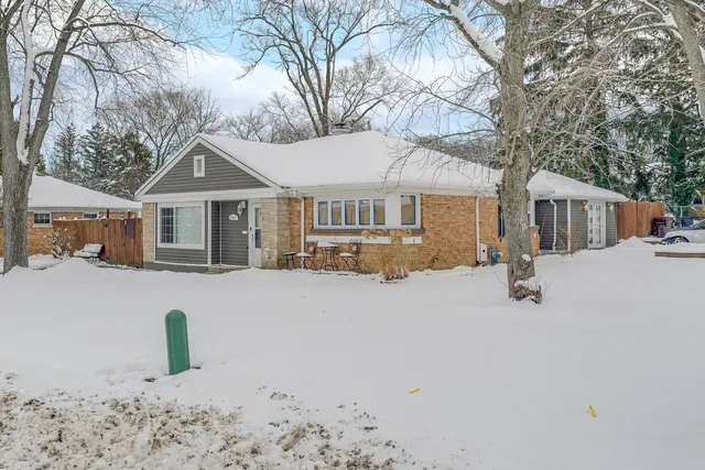 a house with trees in front of it