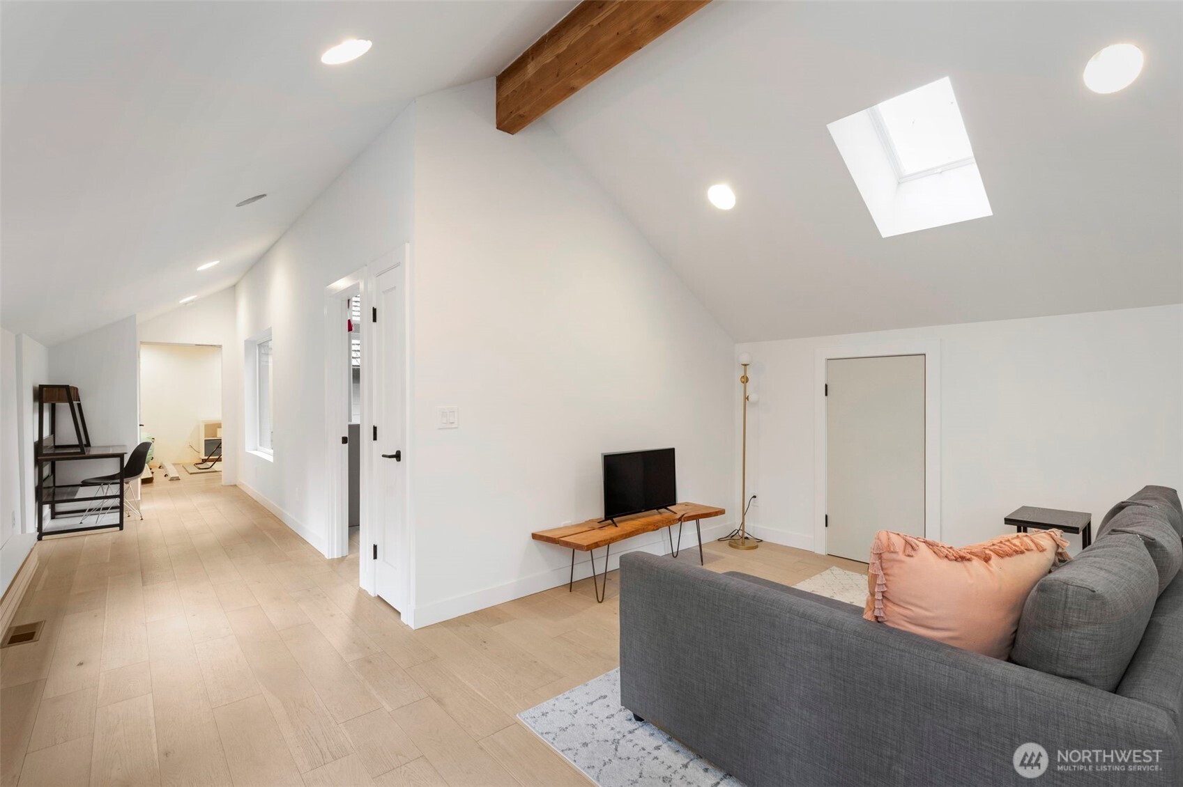16455 Agate Point Road Northeast Bainbridge Island, WA 98110 - Photo 25 of 26 a living room with furniture and a flat screen tv