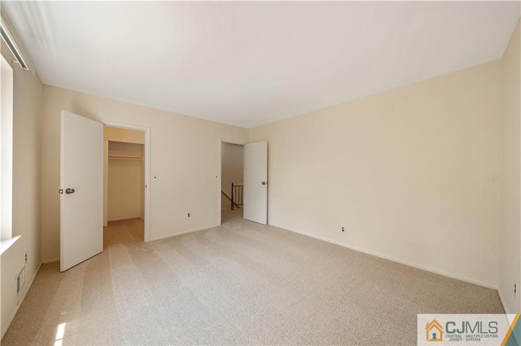 6302 Hana Road Edison, NJ 08817 - Photo 16 of 21 an empty room with a natural light