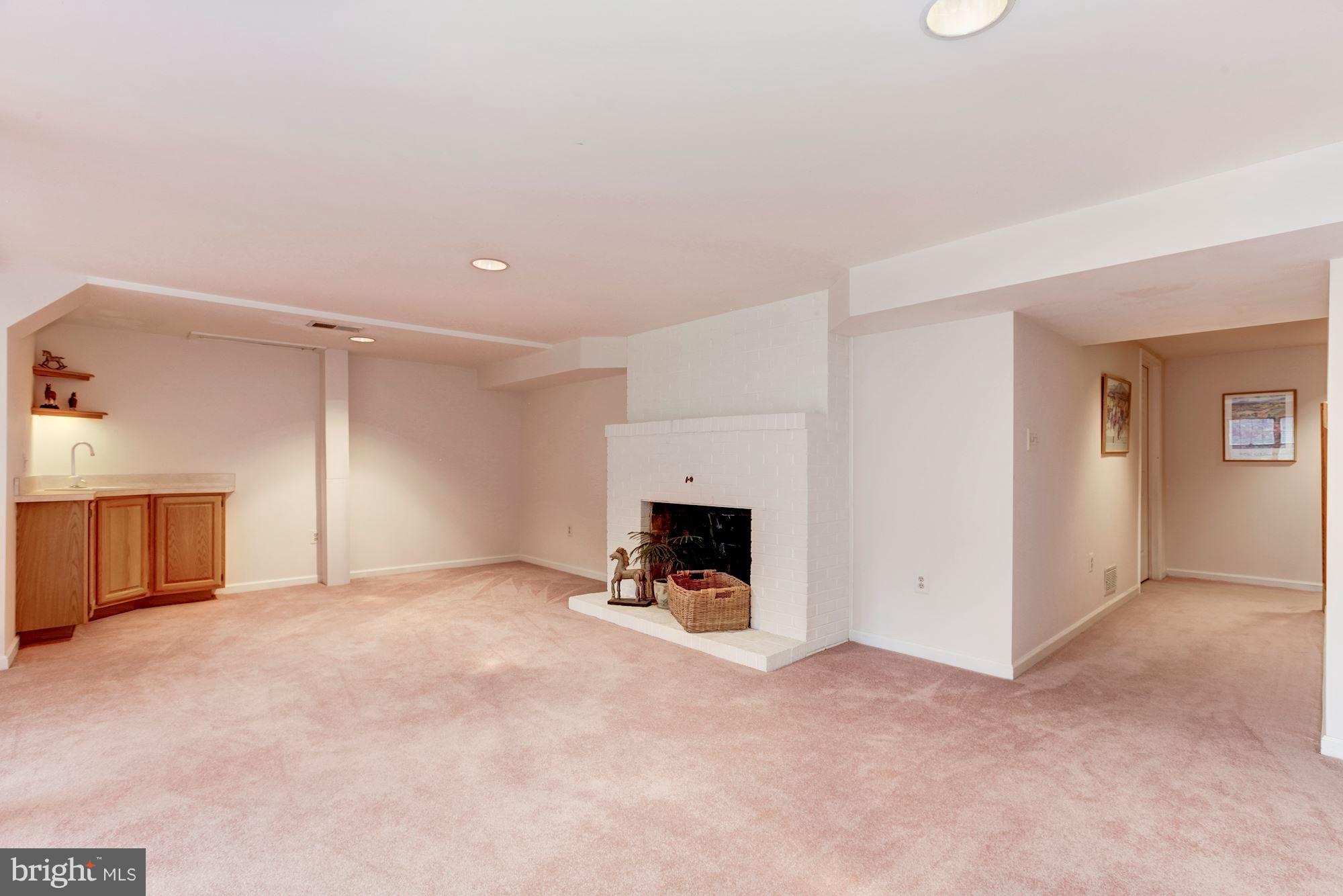 9620 Watkins Road Gaithersburg, MD 20882 - Photo 23 of 30 Recreation Room With Fireplace