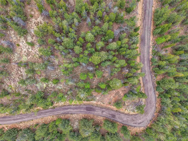 a view of a city with mountains in the background