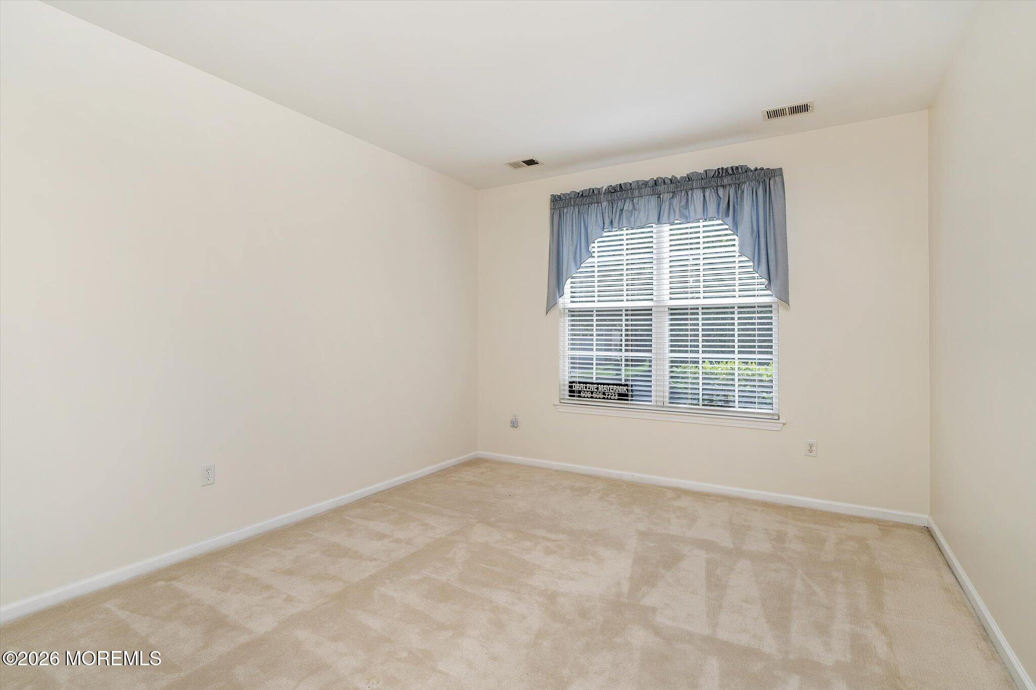 10 Powderhorn Way Allentown, NJ 08501 - Photo 18 of 27 an empty room with a window