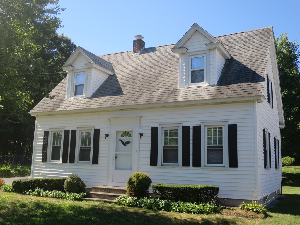 2144 Palmer Road Three Rivers, MA 01080 - Photo 12 of 22 a front view of a house with a yard