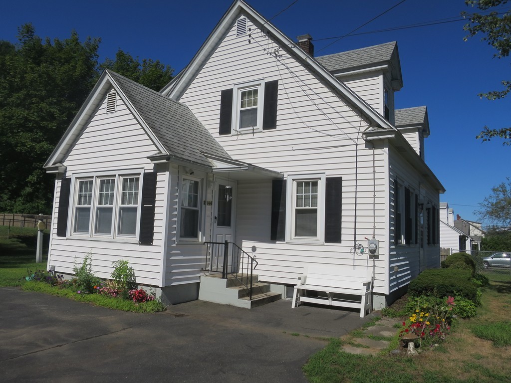 2144 Palmer Road Three Rivers, MA 01080 - Photo 15 of 22 a view of a house with a yard and garden