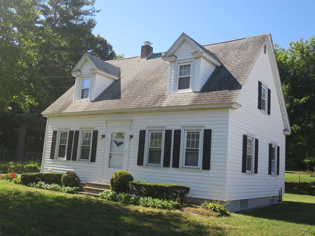 2144 Palmer Road Three Rivers, MA 01080 - Photo 16 of 22 a front view of a house with garden
