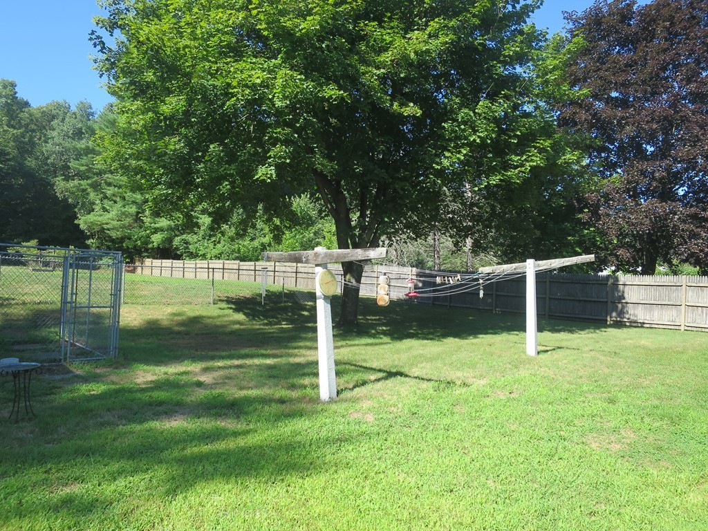 2144 Palmer Road Three Rivers, MA 01080 - Photo 22 of 22 a backyard of a house with lots of green space