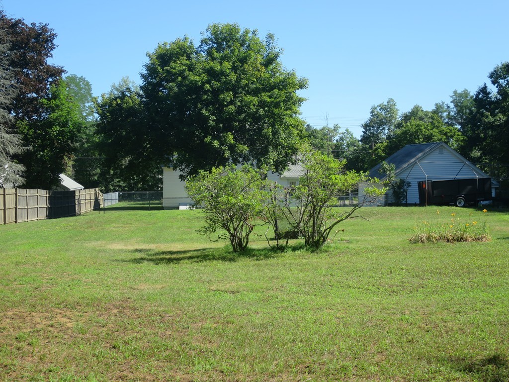 2144 Palmer Road Three Rivers, MA 01080 - Photo 3 of 22 a view of a house with a yard