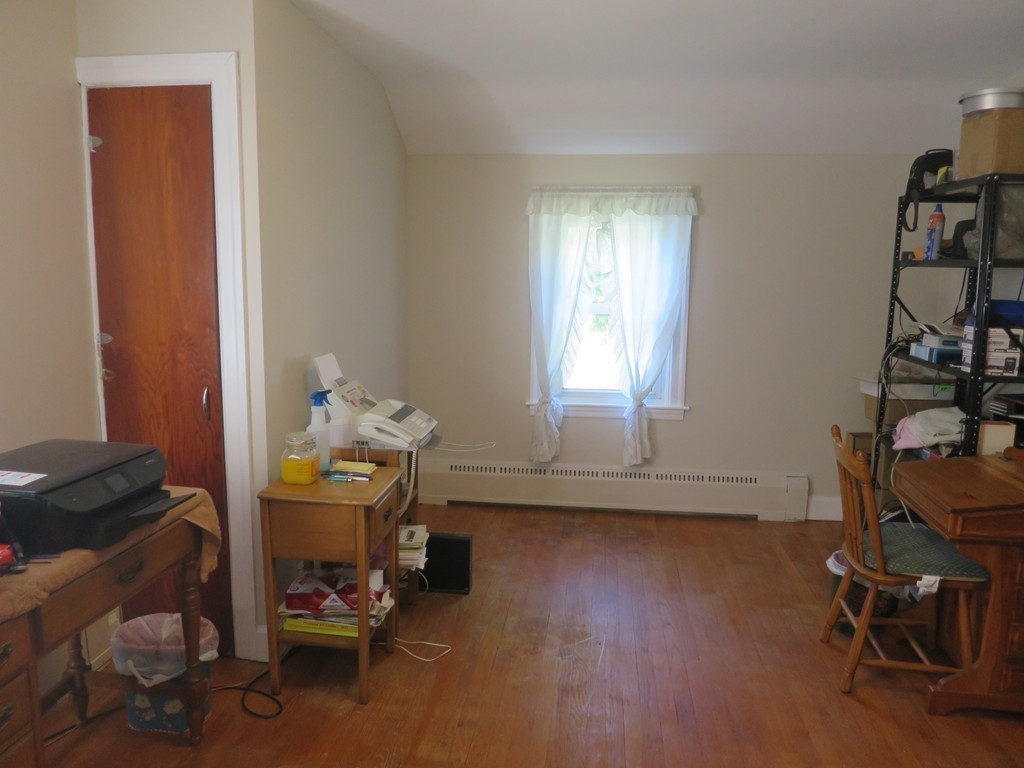 2144 Palmer Road Three Rivers, MA 01080 - Photo 8 of 22 a room with furniture and wooden floor