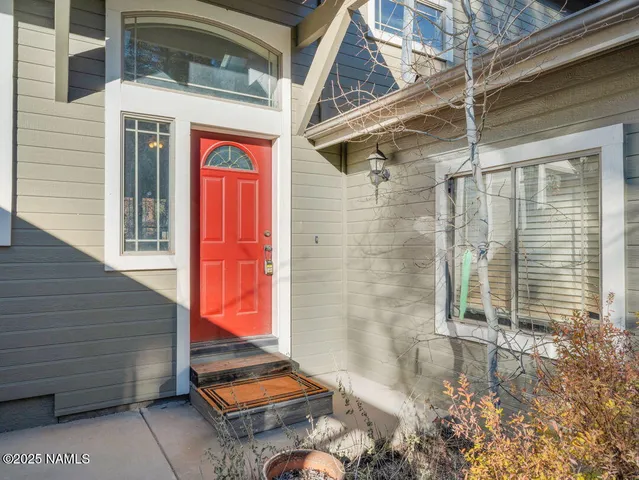 a view of livingroom with furniture and window