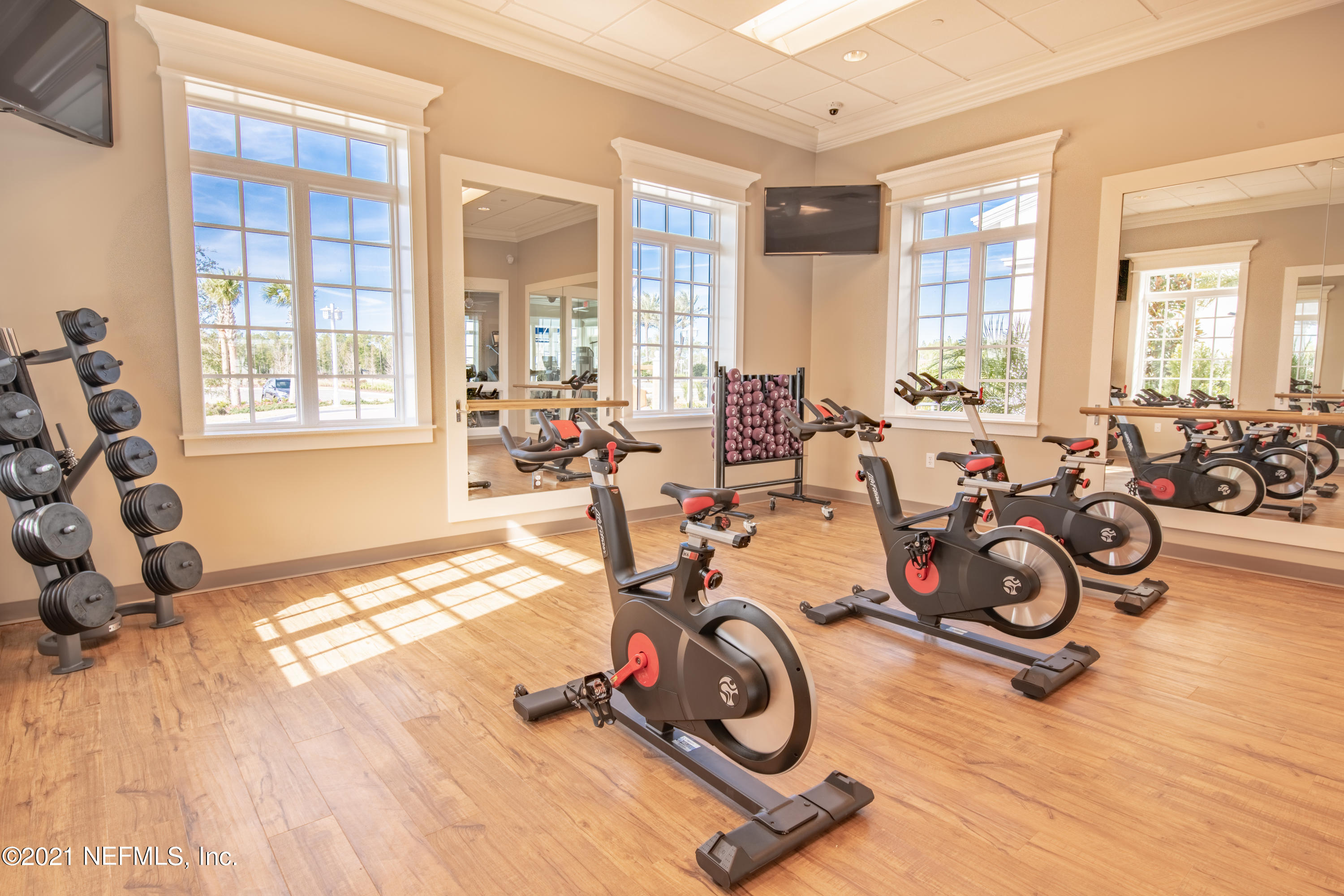 319 Charlie Way St. Augustine, FL 32095 - Photo 17 of 36 a view of a room with gym equipment
