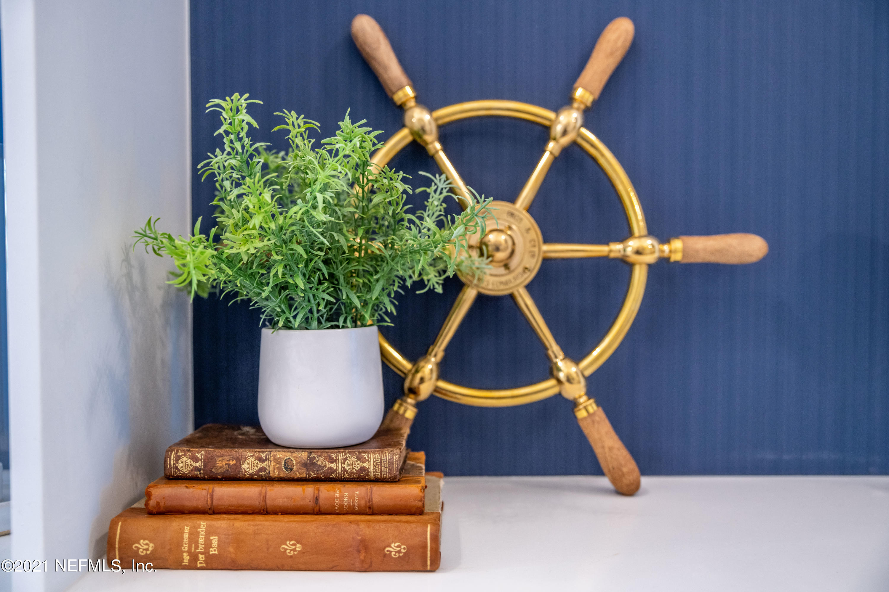 319 Charlie Way St. Augustine, FL 32095 - Photo 25 of 36 a room with painting on the wall and a potted plant