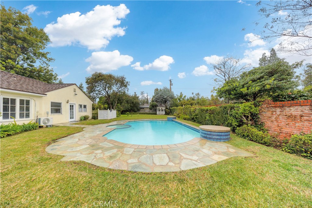 2835 Devonport Road San Marino, CA 91108 - Photo 43 of 54 a view of a house with swimming pool