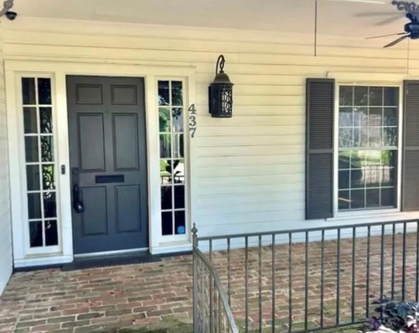 a kitchen with stainless steel appliances kitchen island granite countertop a stove and refrigerator