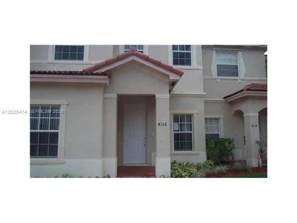 a view of a house with a balcony