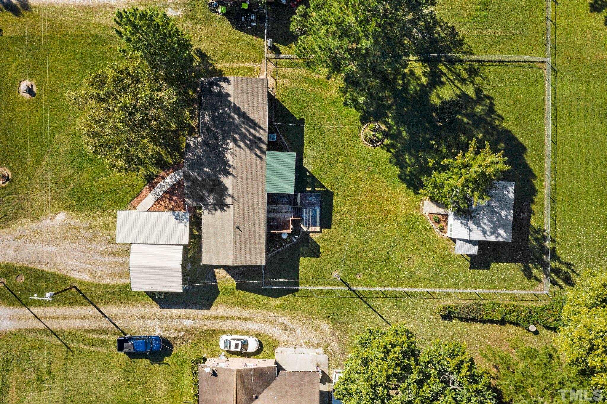 774 Abbott Road Henderson, NC 27537 - Photo 38 of 41 an aerial view of a house with swimming pool