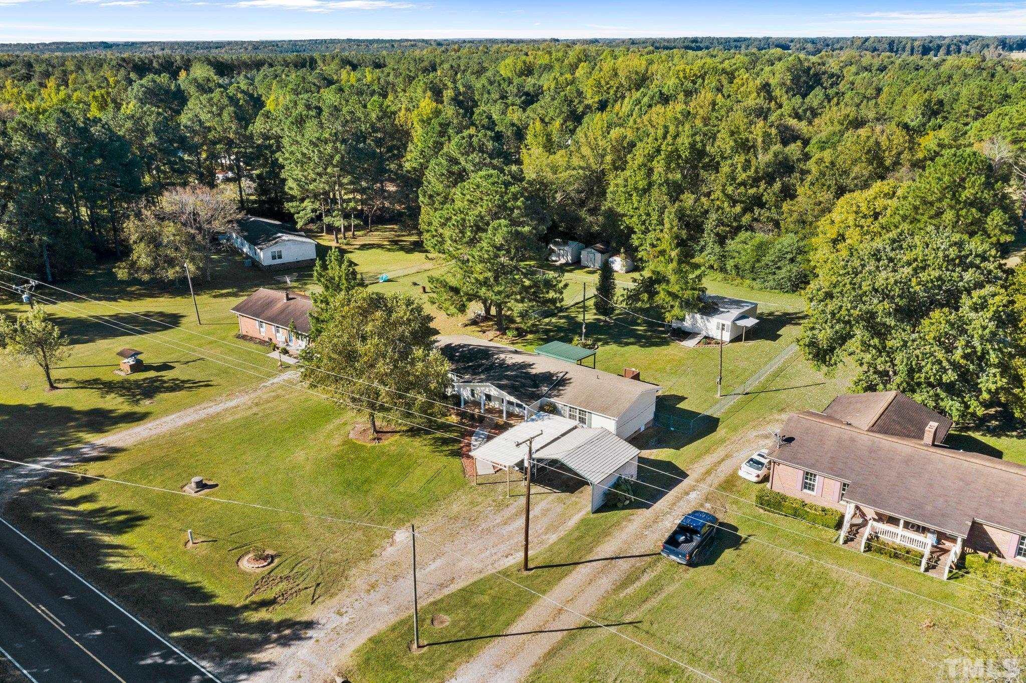 774 Abbott Road Henderson, NC 27537 - Photo 39 of 41 an aerial view of residential house with outdoor space and swimming pool