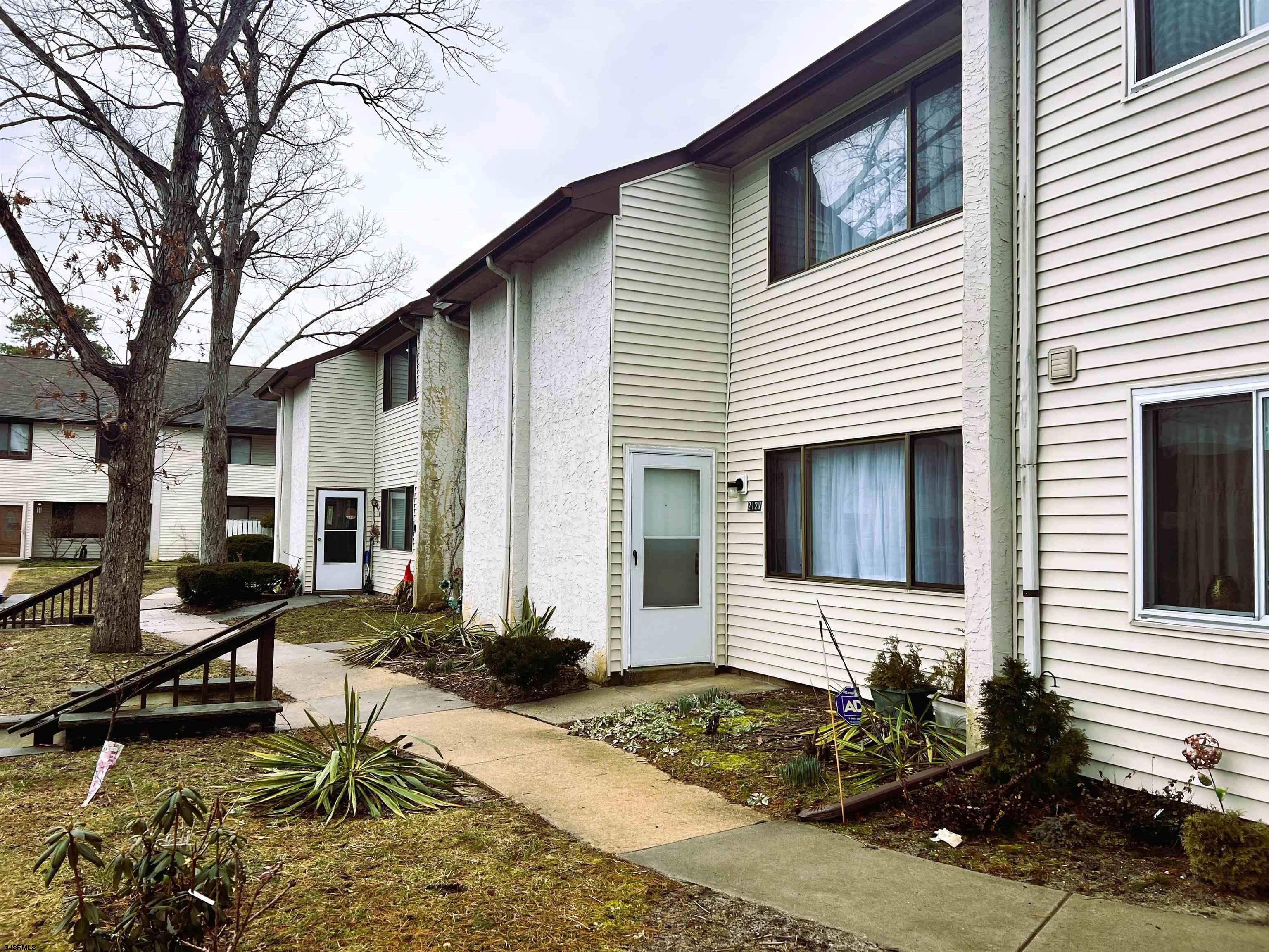 2127 Rhododendron Court, Unit 25 Mays Landing, NJ 08330 - Photo 1 of 18 a view of a house with a patio