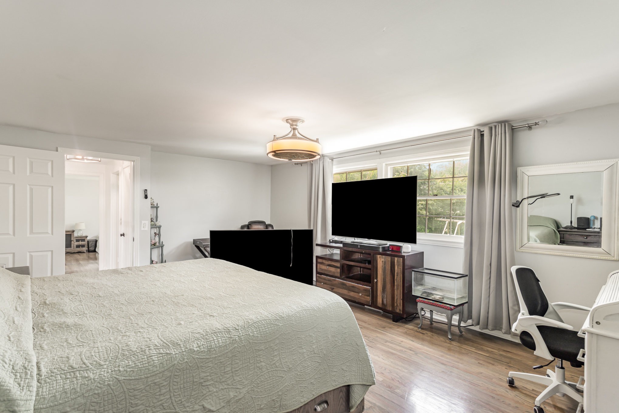222 Wallace Road Nashville, TN 37211 - Photo 11 of 25 a bedroom with a bed and a flat screen tv