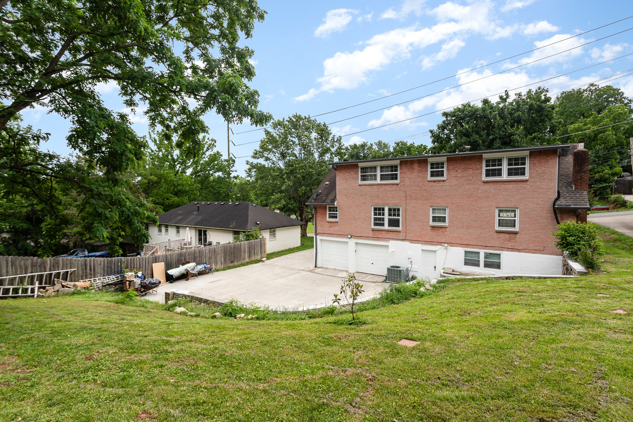 222 Wallace Road Nashville, TN 37211 - Photo 7 of 25 a view of a house with a yard and sitting area