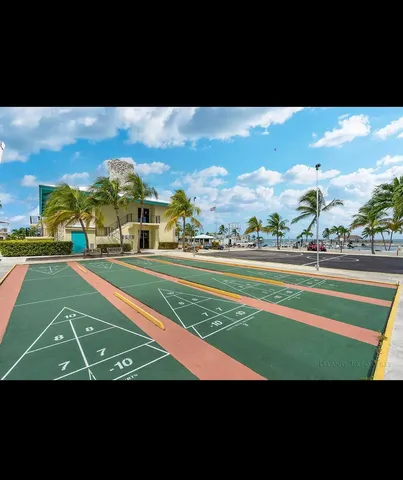 a view of an outdoor space and tennis court