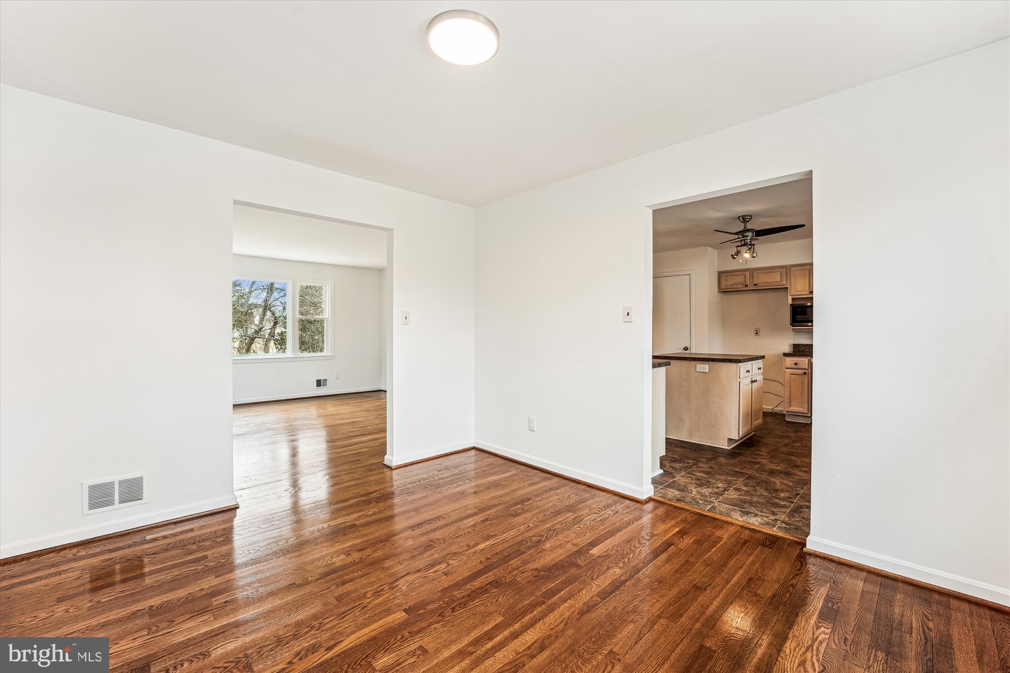 8475 Wedding Drive Welcome, MD 20693 - Photo 17 of 48 a view of empty room with wooden floor