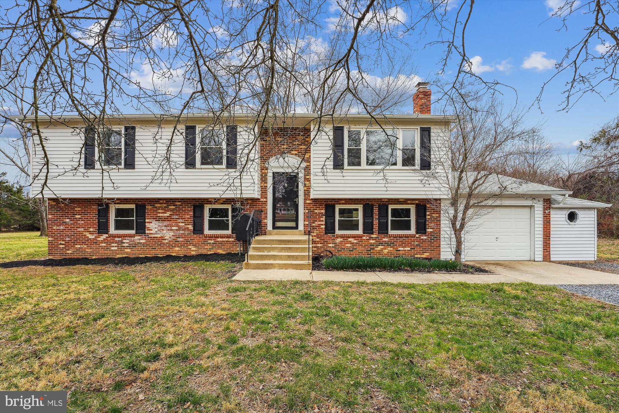 8475 Wedding Drive Welcome, MD 20693 - Photo 2 of 48 a front view of a house with a yard