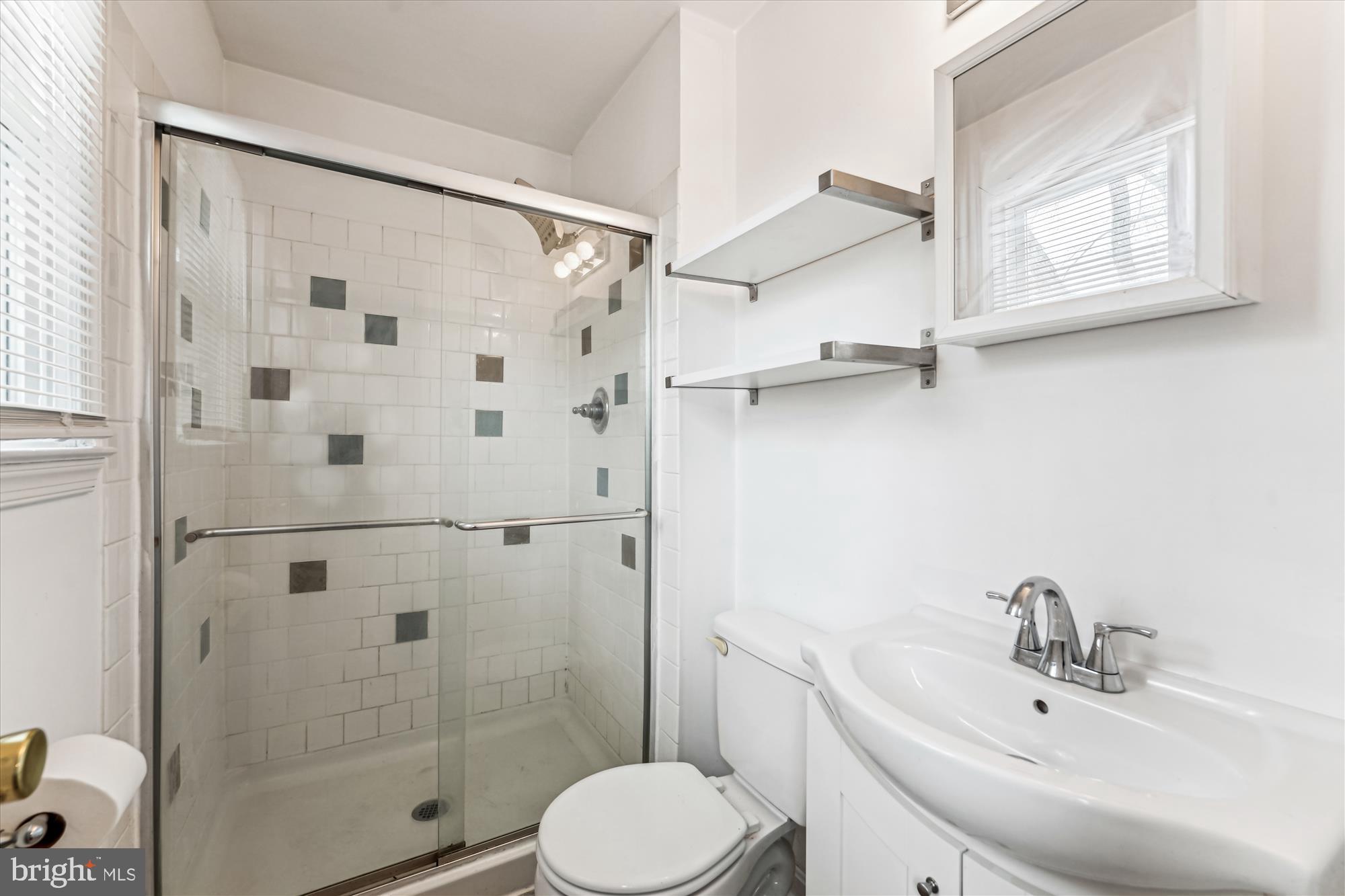 8475 Wedding Drive Welcome, MD 20693 - Photo 23 of 48 a bathroom with a sink toilet and shower