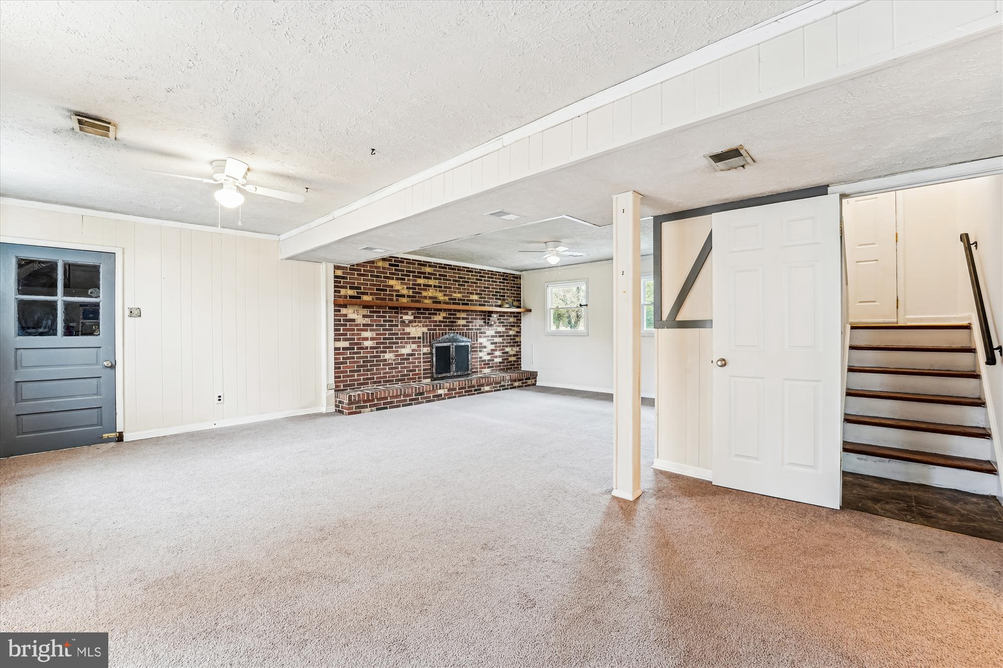 8475 Wedding Drive Welcome, MD 20693 - Photo 32 of 48 en empty room with windows and ceiling fan
