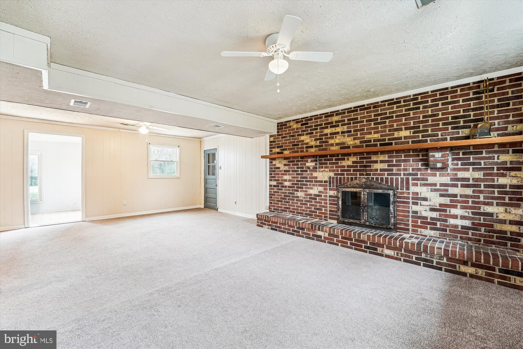 8475 Wedding Drive Welcome, MD 20693 - Photo 34 of 48 a view of empty room with a fireplace