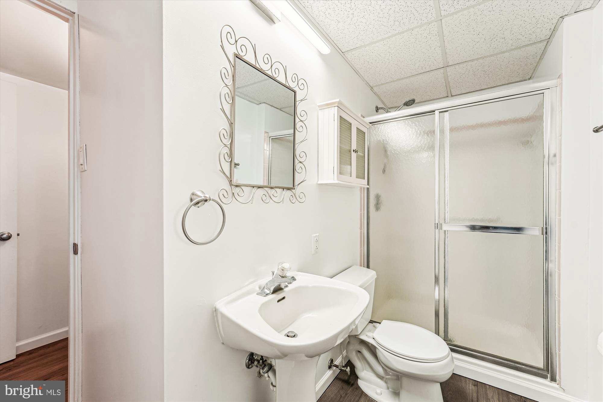 8475 Wedding Drive Welcome, MD 20693 - Photo 36 of 48 a bathroom with a toilet sink shower and mirror