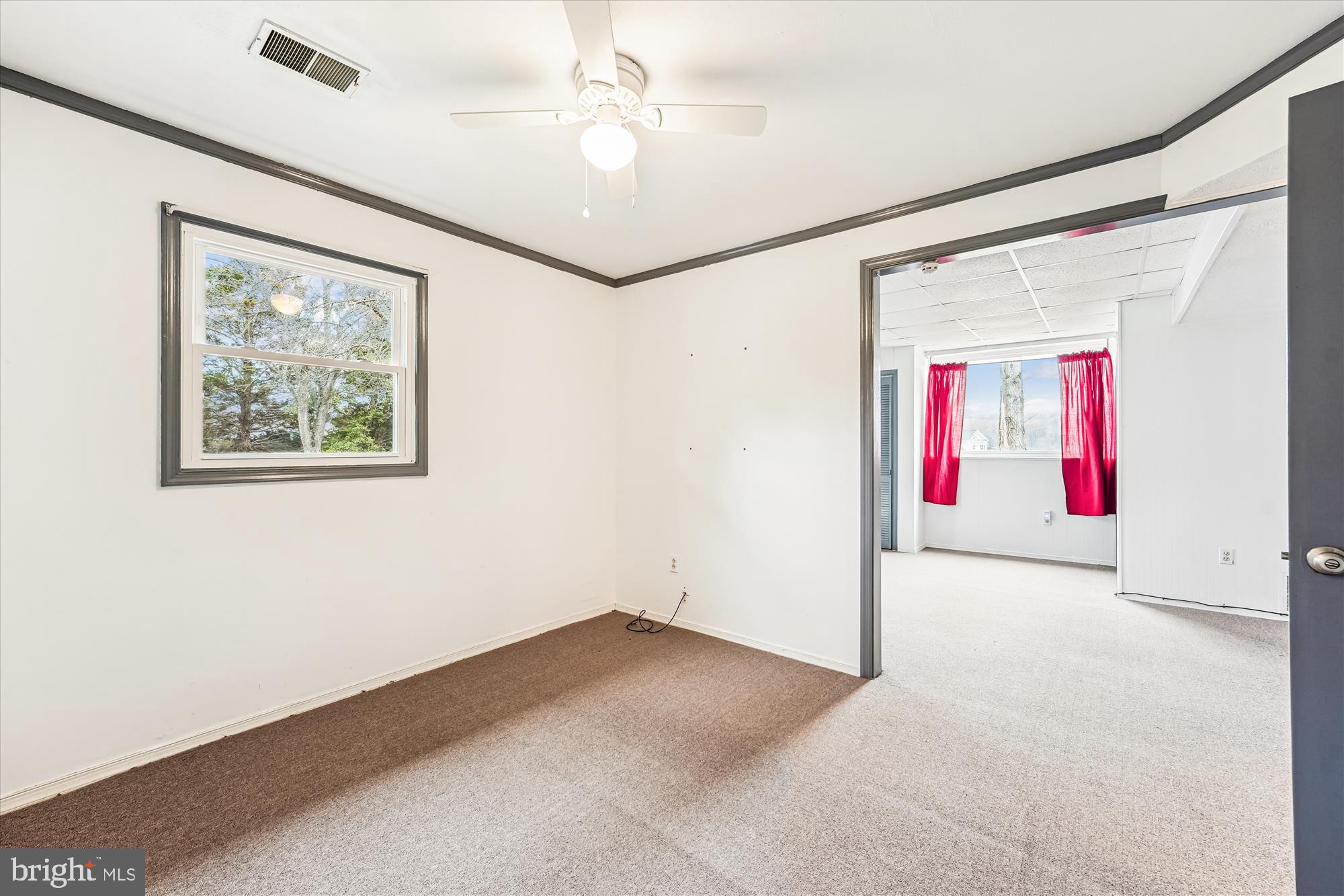 8475 Wedding Drive Welcome, MD 20693 - Photo 38 of 48 an empty room with windows and fan