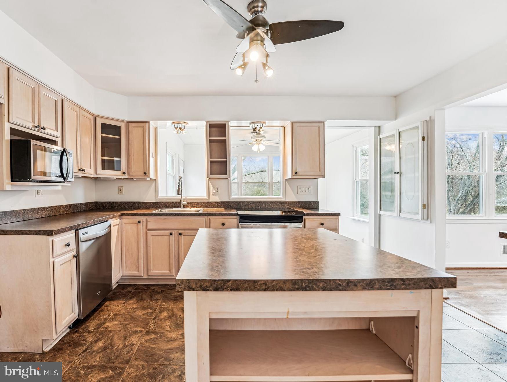 8475 Wedding Drive Welcome, MD 20693 - Photo 8 of 48 a large kitchen with granite countertop a stove and a sink