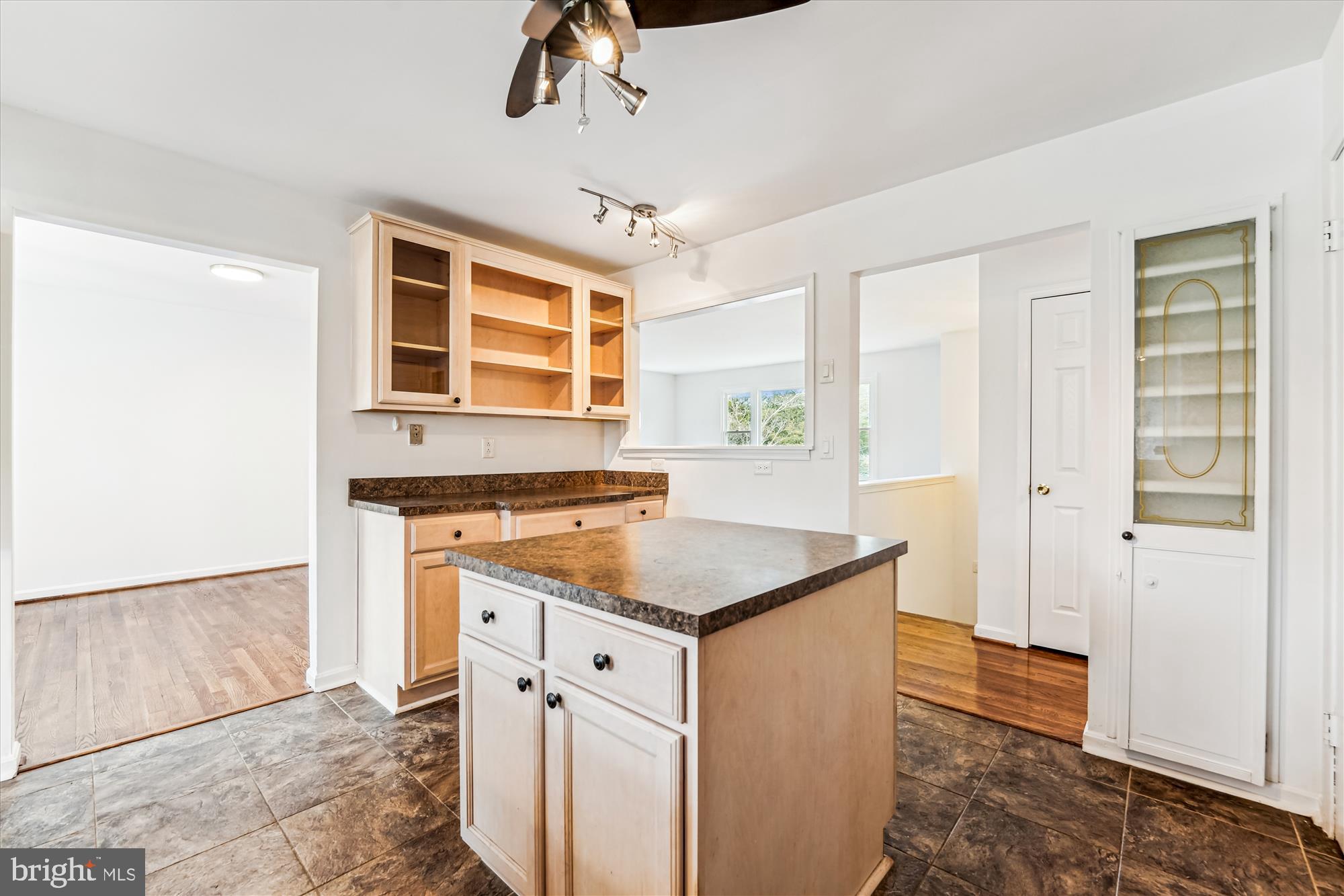 8475 Wedding Drive Welcome, MD 20693 - Photo 9 of 48 a kitchen with stainless steel appliances granite countertop a sink and a refrigerator