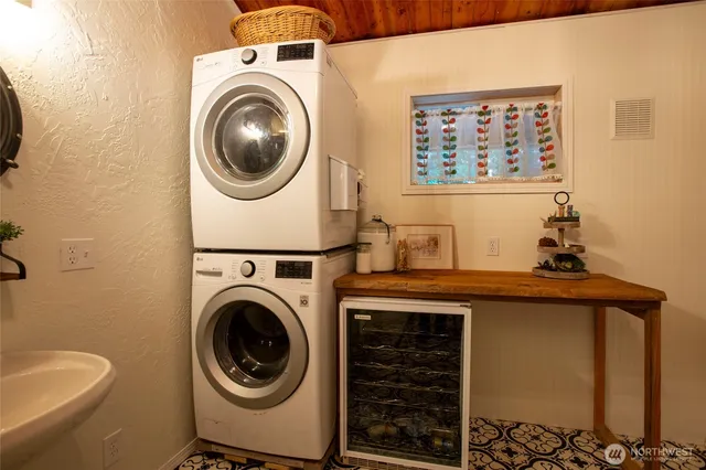a utility room with dryer and washer
