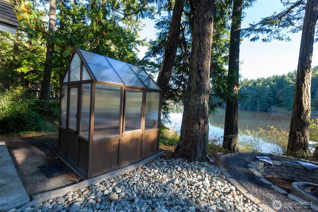 a backyard of a house with lots of green space