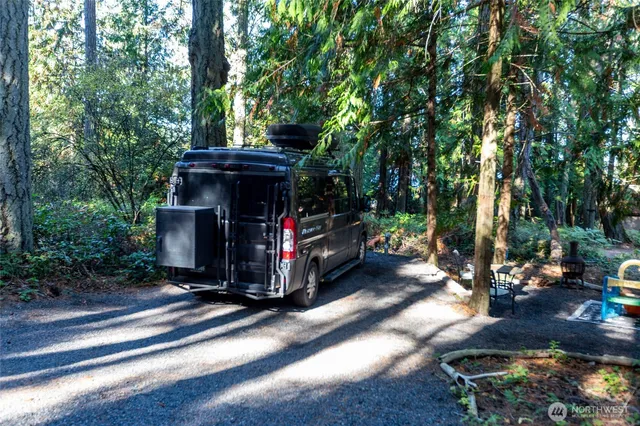 a view of a couches in backyard of house