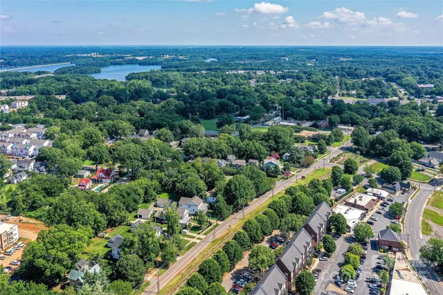 an aerial view of a city with lots of residential buildings