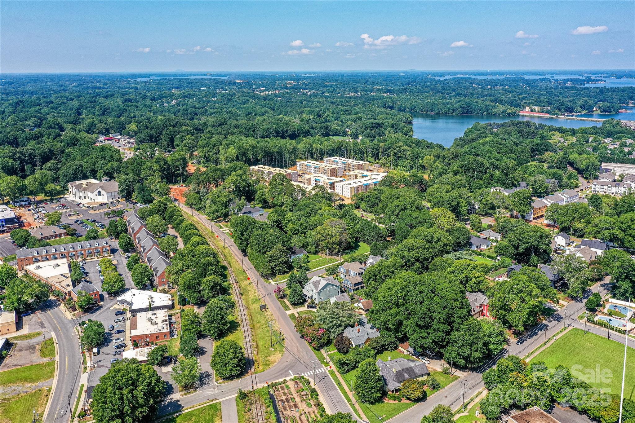 504 Potts Street Davidson, NC 28036 - Photo 25 of 34 an aerial view of a city with lots of residential buildings