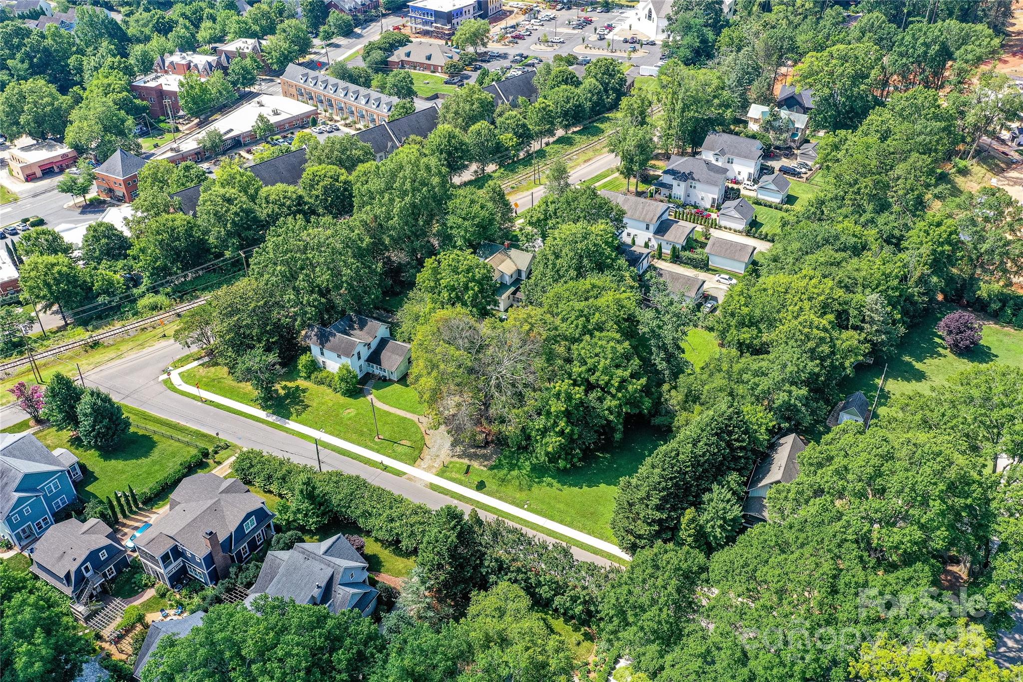 504 Potts Street Davidson, NC 28036 - Photo 10 of 34 an aerial view of residential house with outdoor space and street view