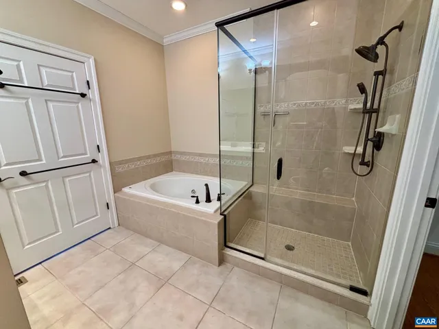 a bathroom with a bath tub