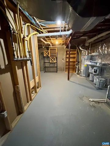 a view of empty room with wooden walls